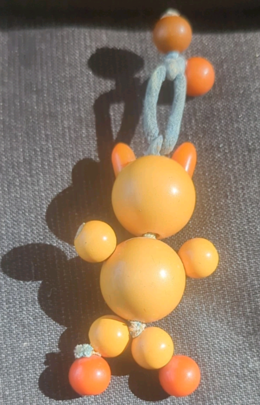 Vintage Bakelite Tykie Toys Bead Doll Crib Toy Cat